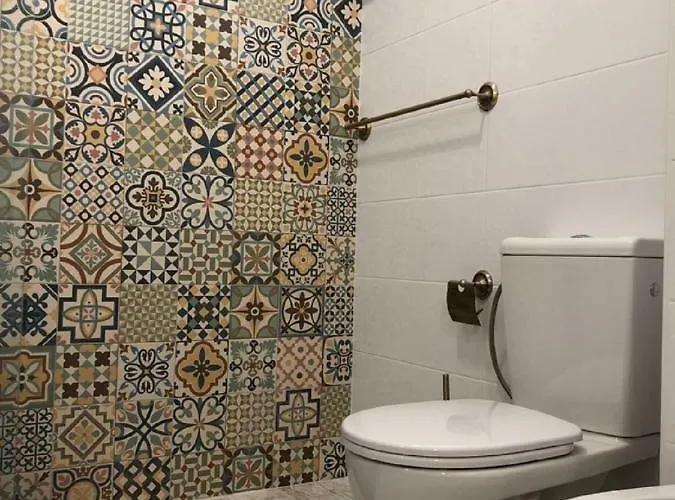 Village Island Heights Апартаменти Адехе